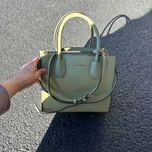 Square MK mini shoulder bag.